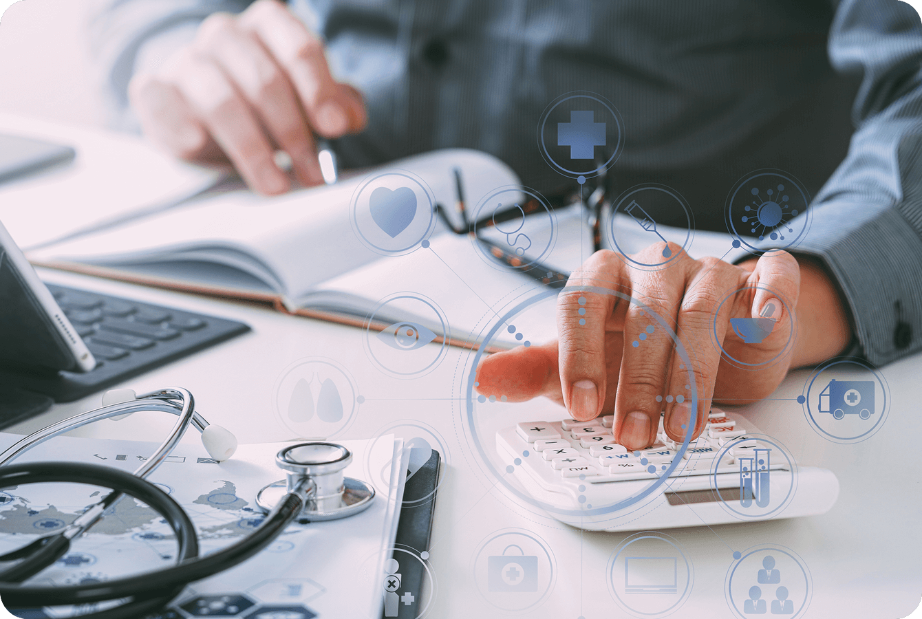 Healthcare professional using calculator and notebook.